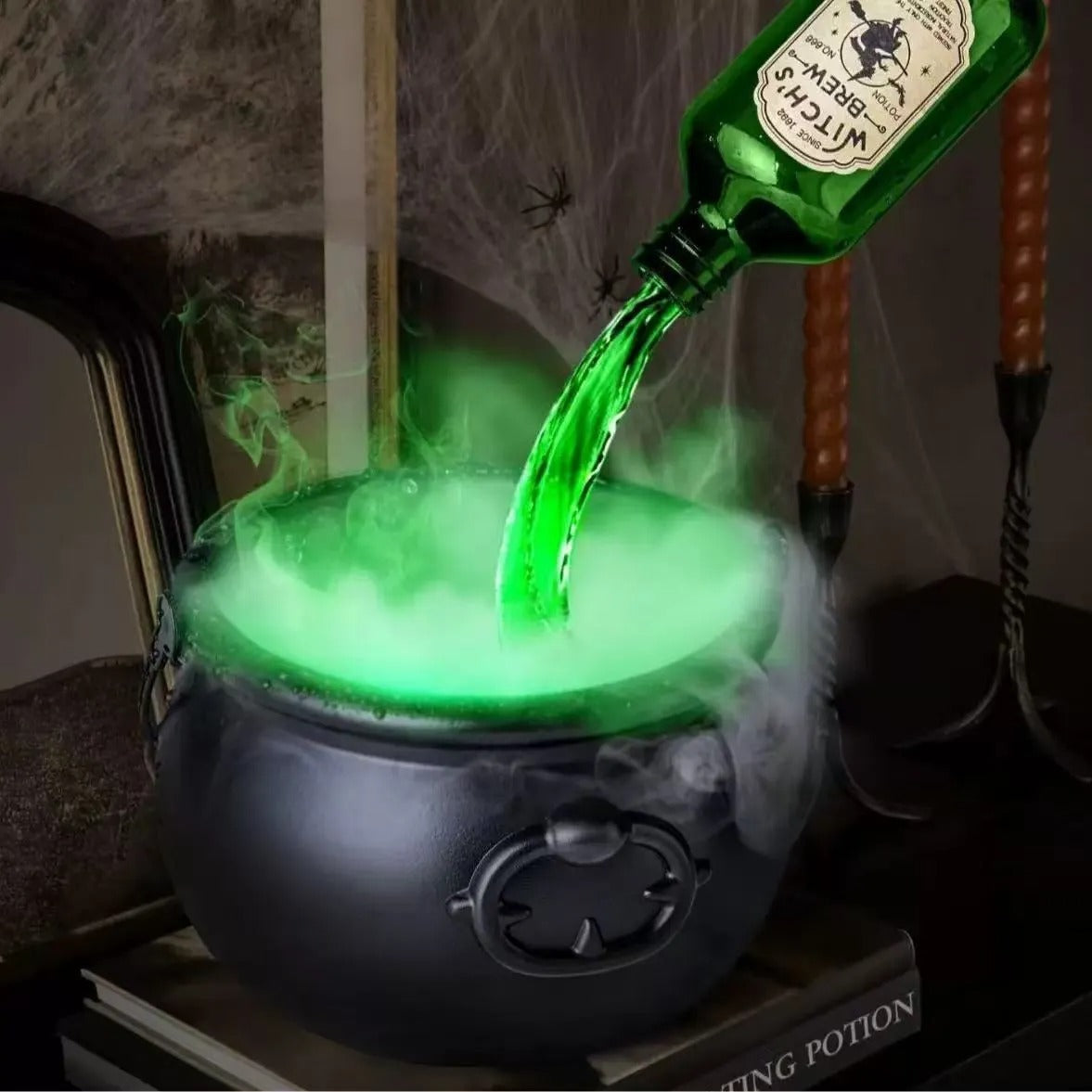 Spooky witch’s cauldron – Fog and floating magic bottle feature Homezys